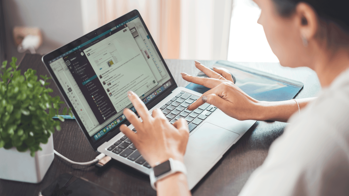 person searching job listings laptop