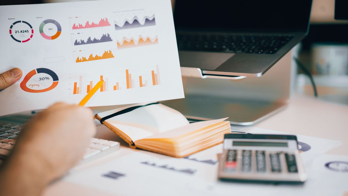 bar chart exam pass rate statistics, office desk