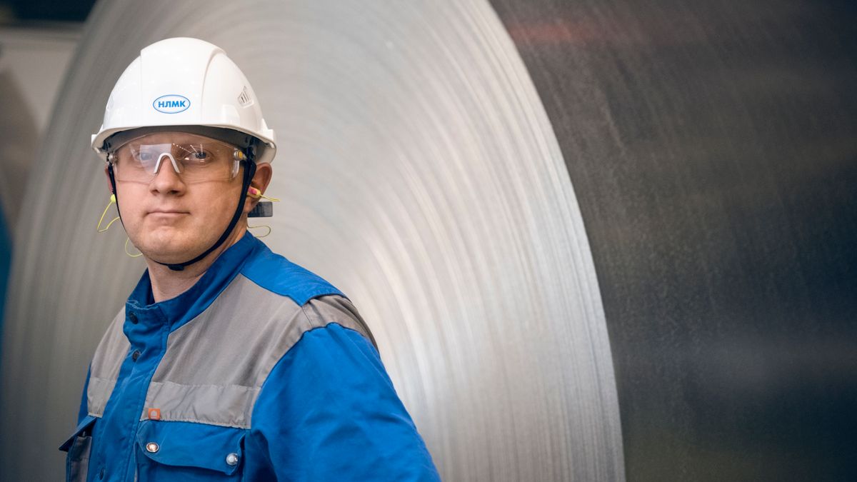factory worker portrait safety helmet