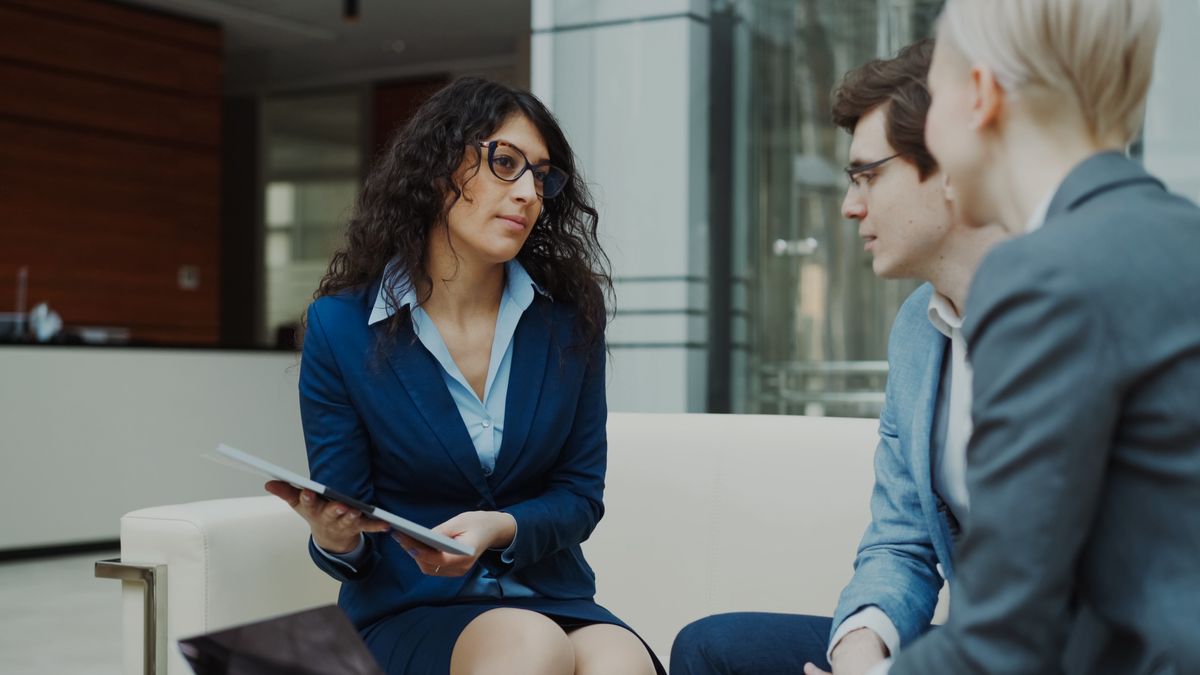 business coach client conversation office