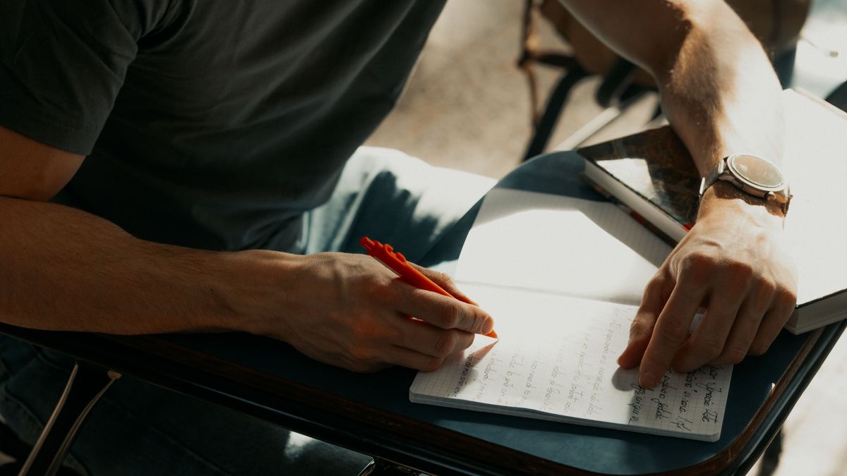 engineer studying notes at desk