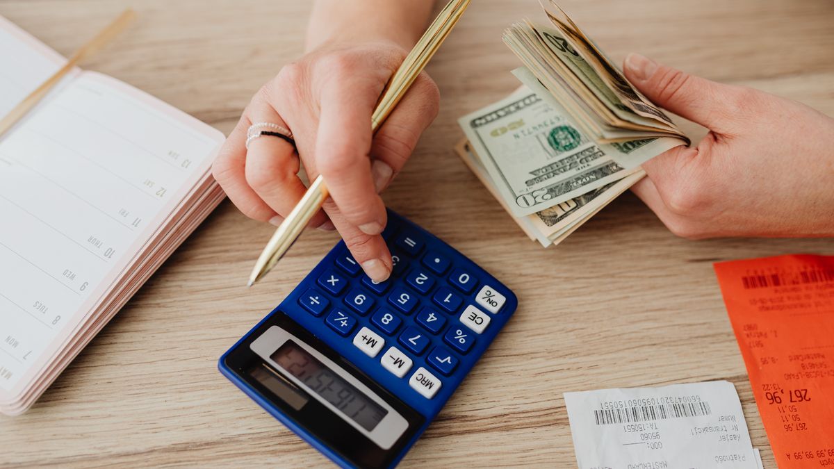calculator budget notebook desk