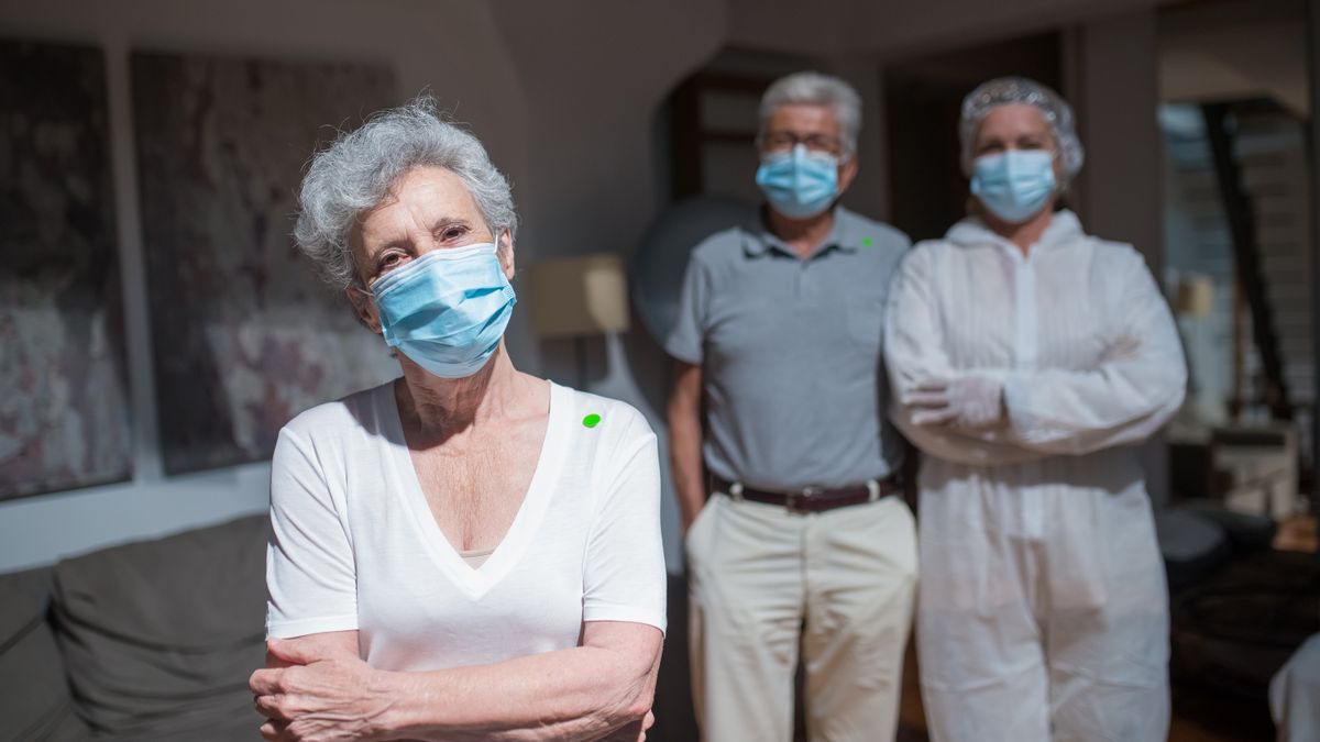 elderly care worker smiling colleague