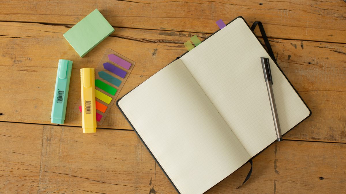 study planner notebook desk evening