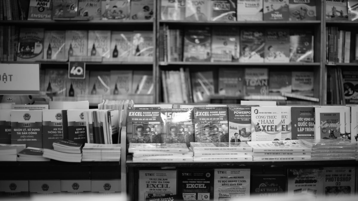 stack of english vocabulary textbooks, bookshelf