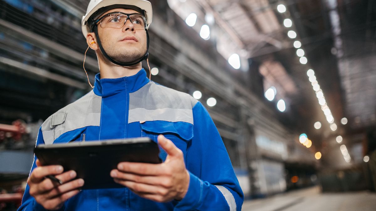 safety officer inspecting factory workplace