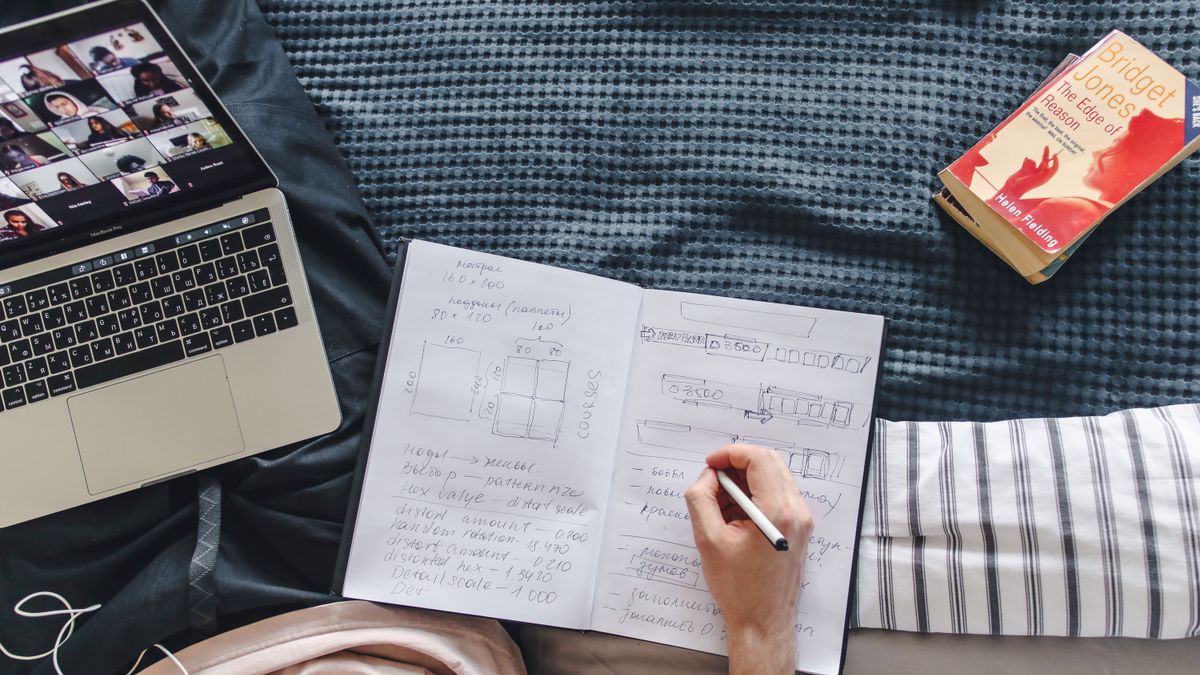 woman studying online course laptop notebook