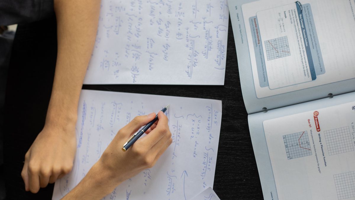 exam desk textbooks studying