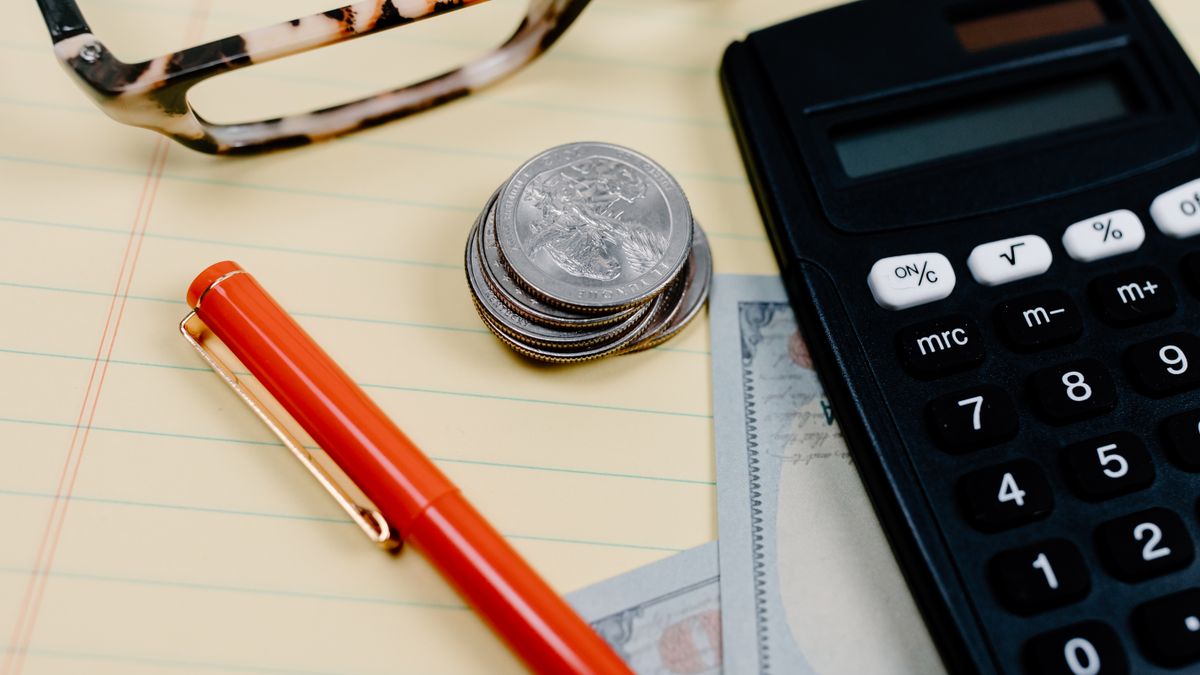japanese calculator, savings money on desk