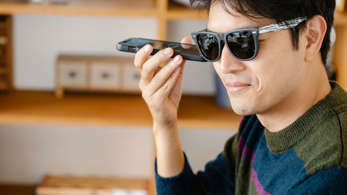 person recording voice with smartphone practicing english speaking