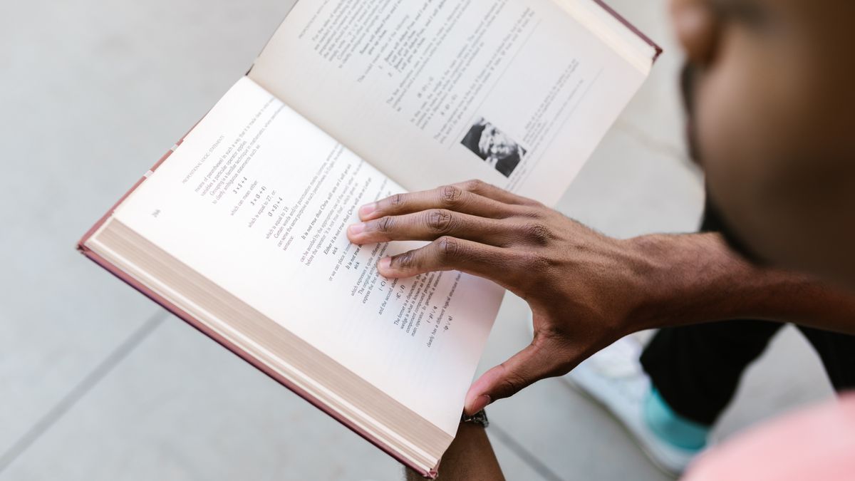 nutrition student studying textbook