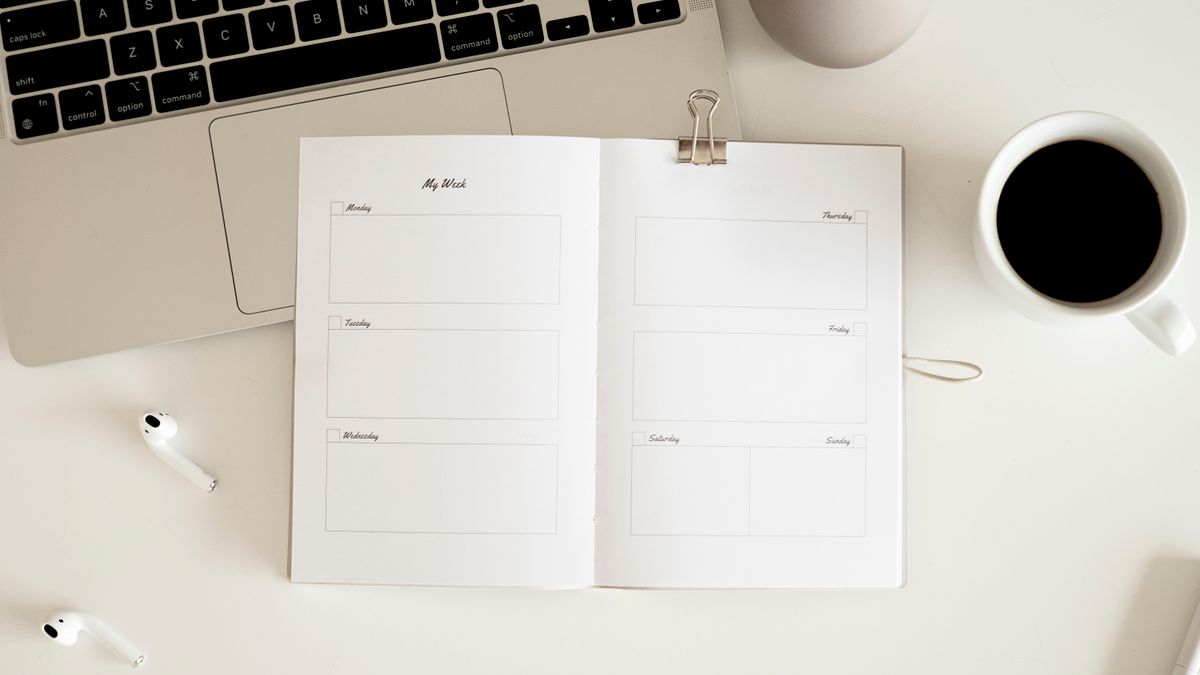 weekly study planner notebook desk