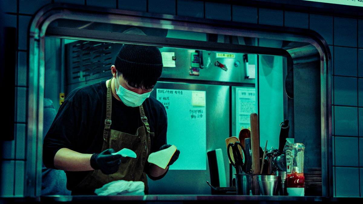 chef checking food temperature hygiene