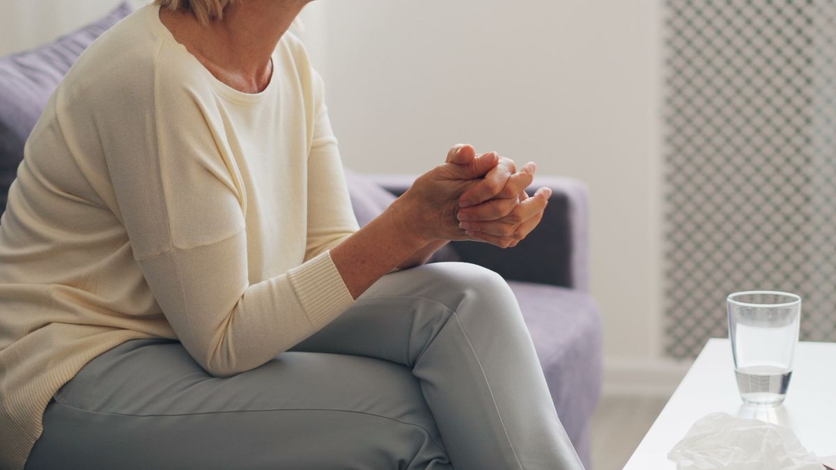social worker consulting elderly person