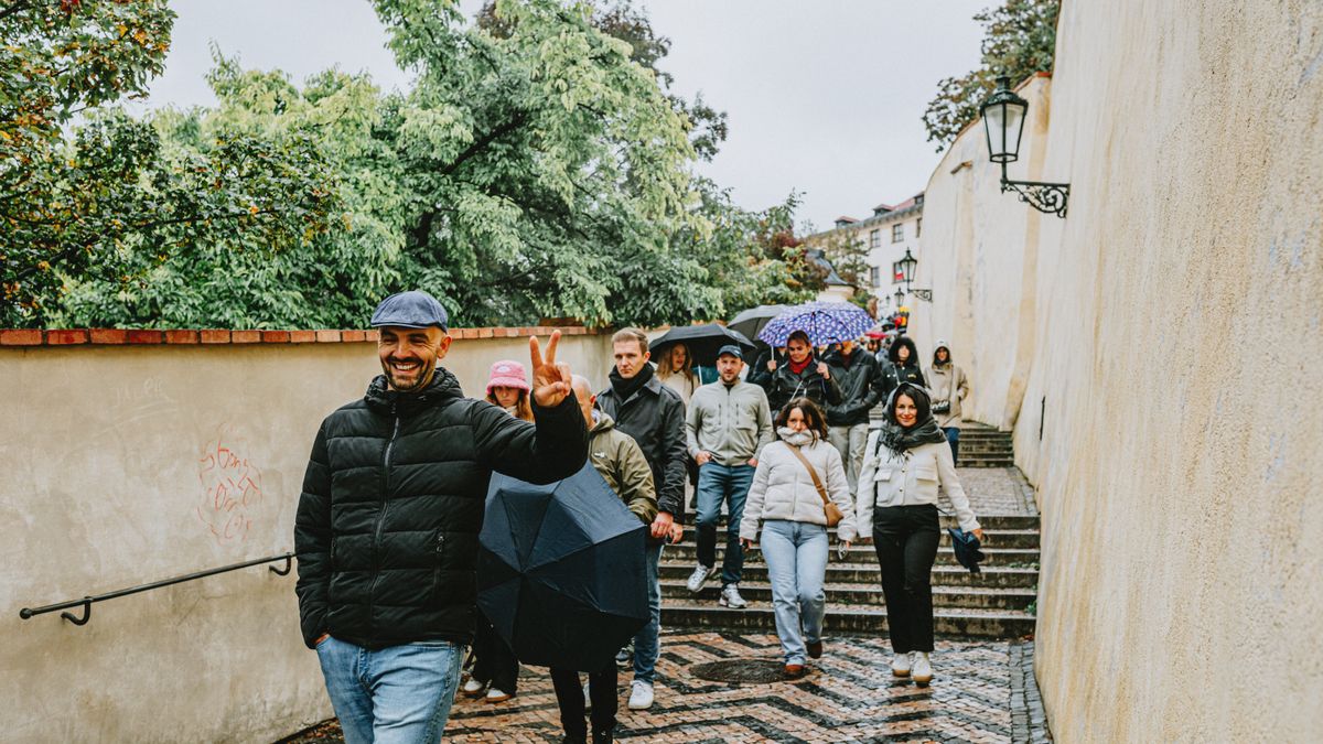 tour guide leading tourists sightseeing