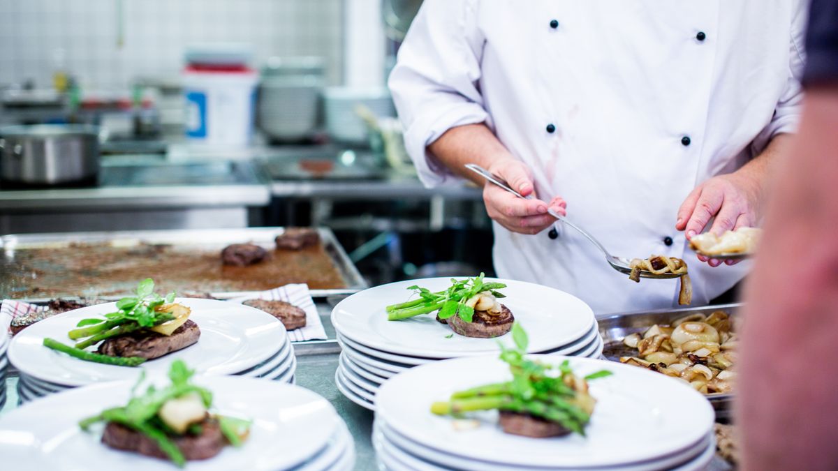chef cooking in restaurant kitchen