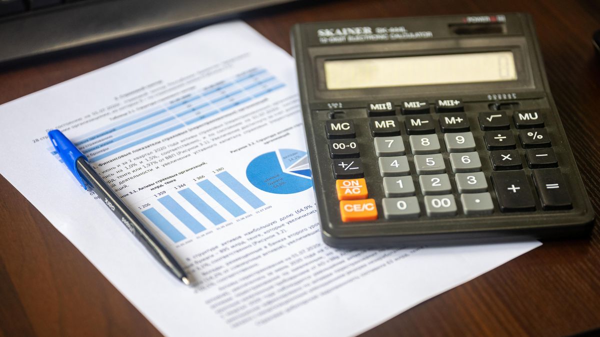 calculator with documents on office desk