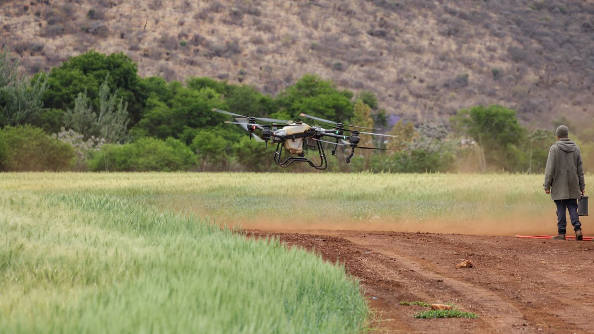 delivery drone flying over countryside
