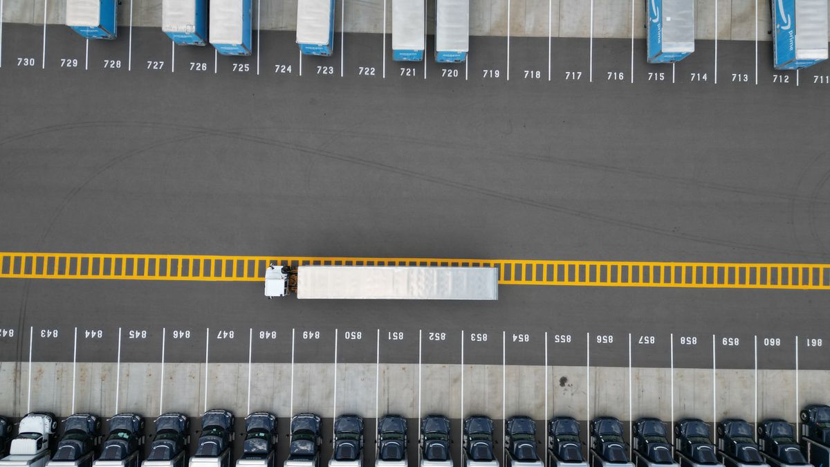 truck fleet parked at logistics depot