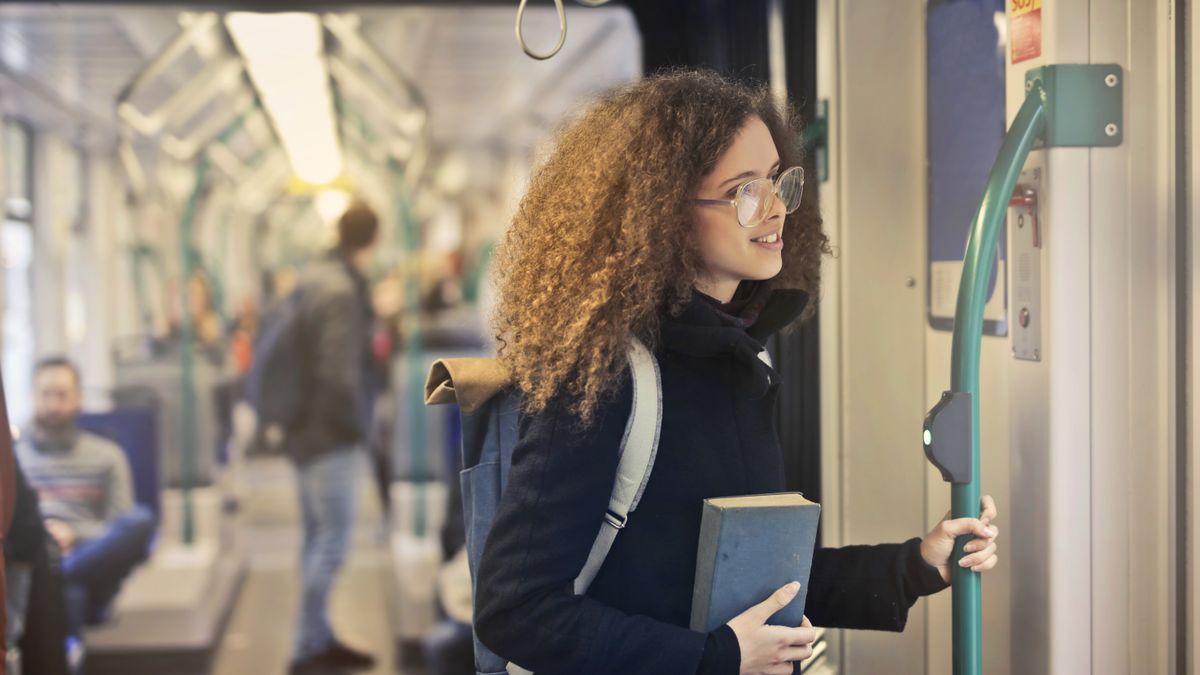 commuter reading notes on train
