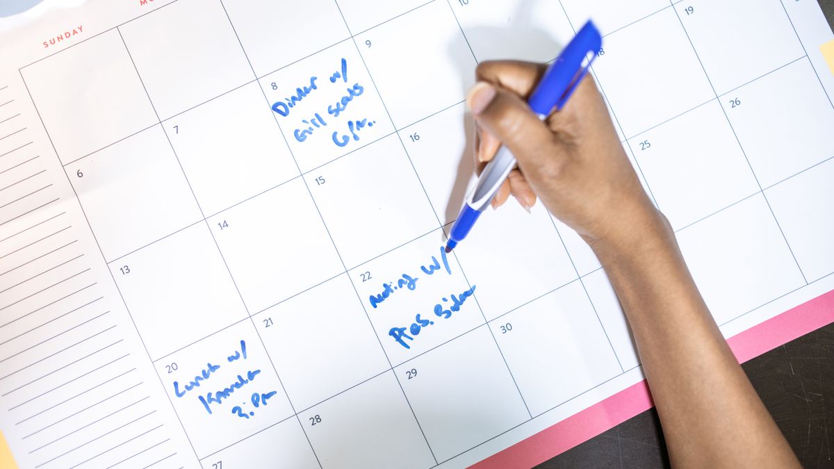 person planning study schedule with calendar clock