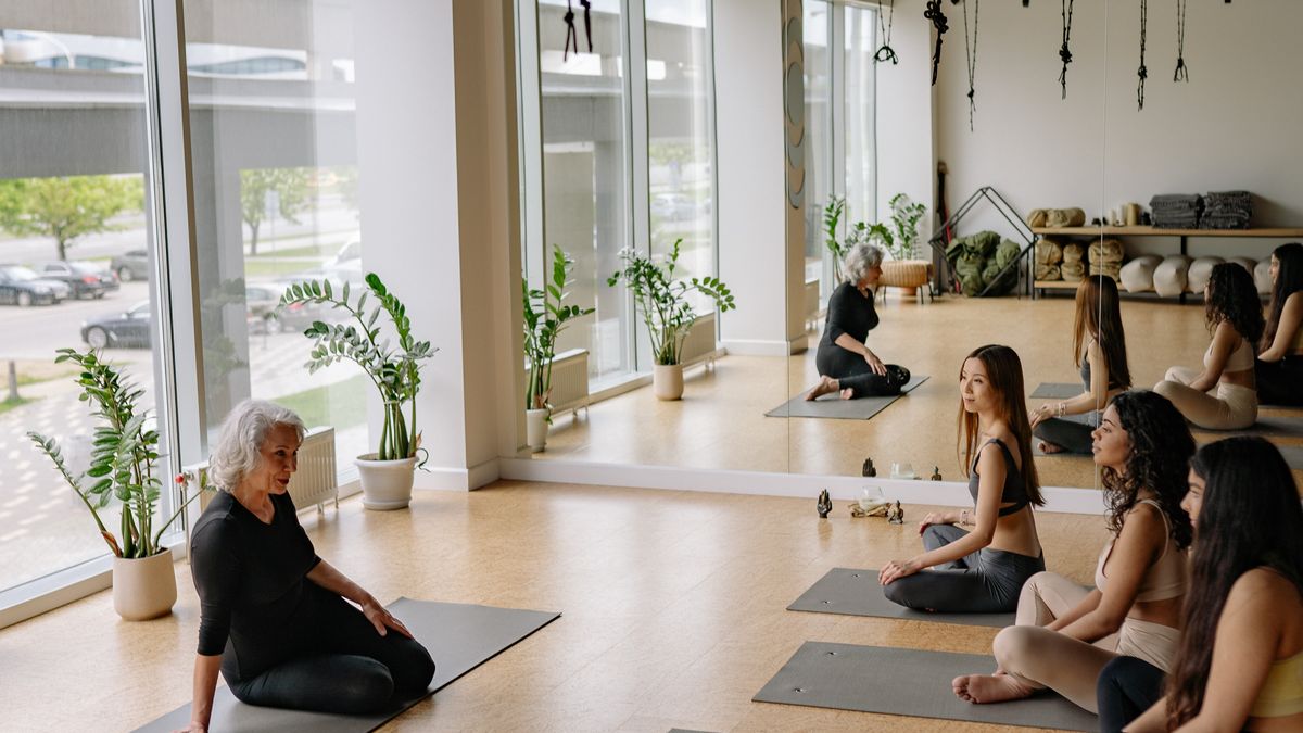 yoga instructor teaching a class