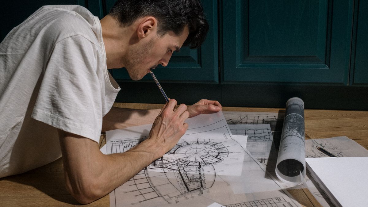 architecture student drafting floor plan