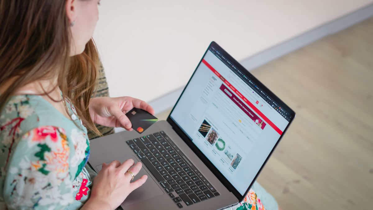 woman comparing online courses on laptop