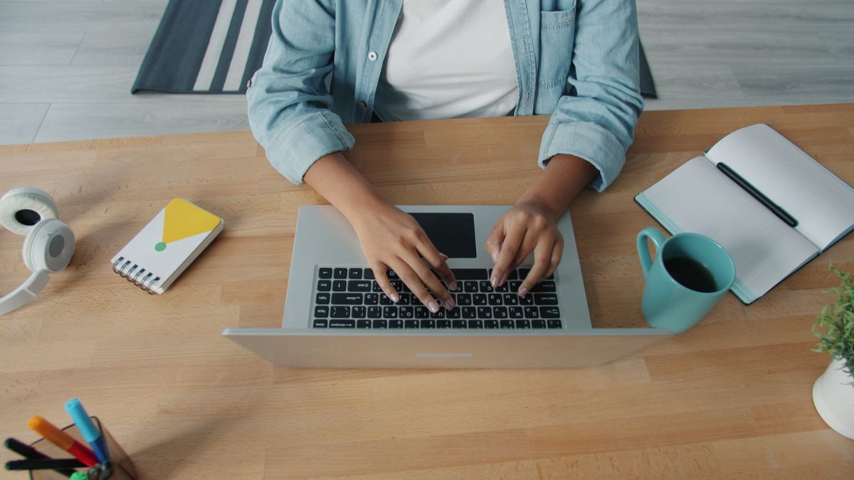 person taking computer based test at desk