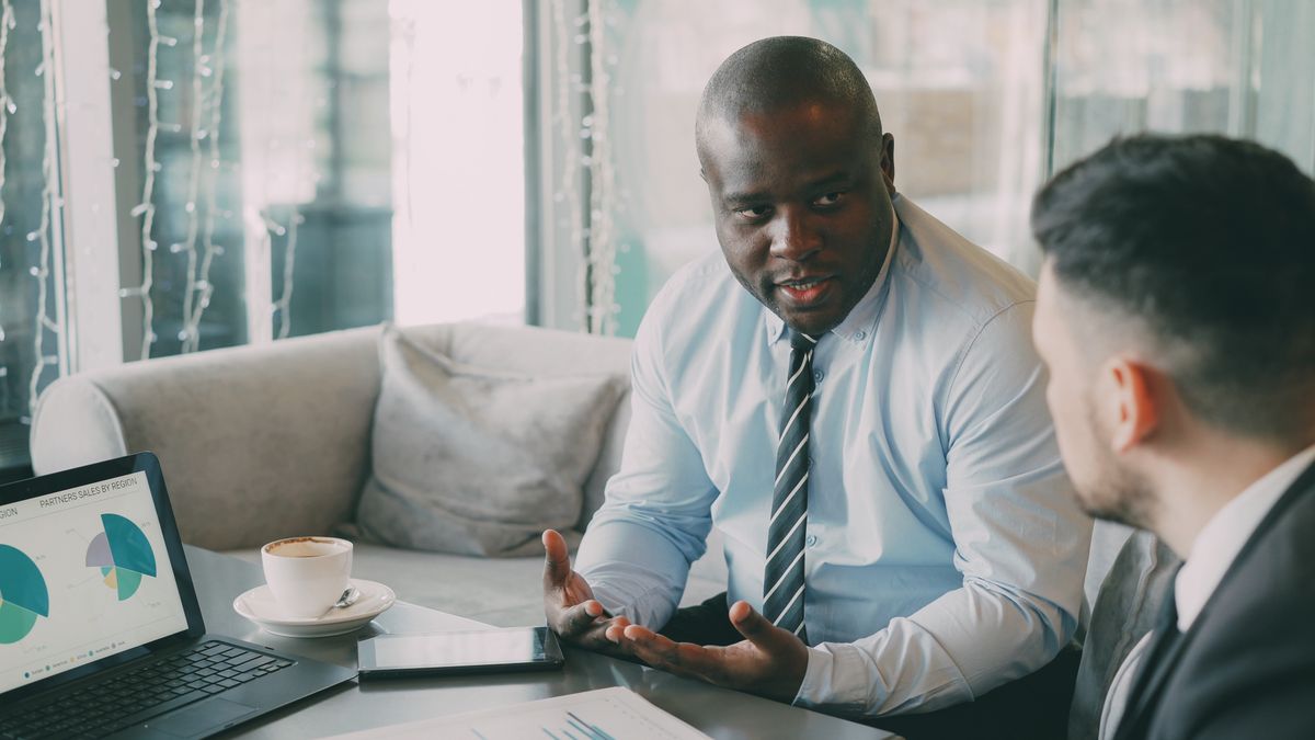 financial planner consulting with client