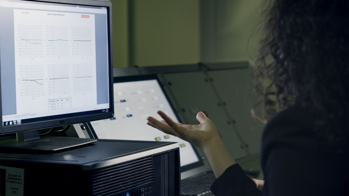 meteorologist analyzing weather map on computer