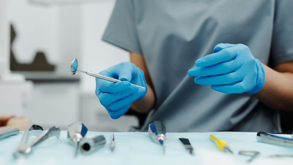 dental clinic staff preparing instruments