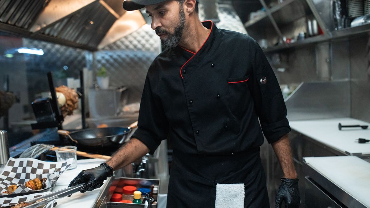 chef cooking in professional kitchen