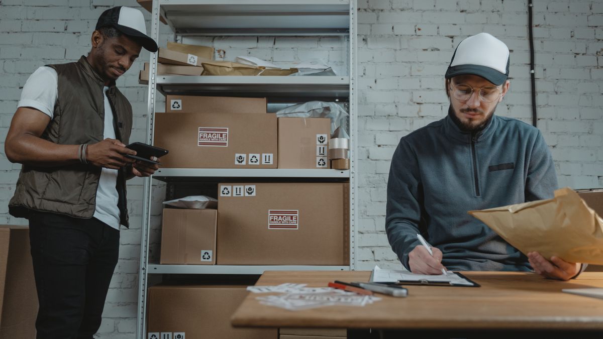 logistics manager reviewing delivery schedule