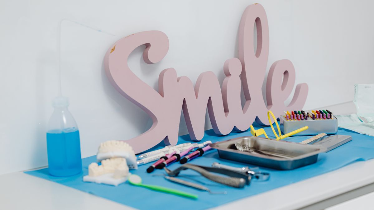 dental clinic assistant preparing instruments