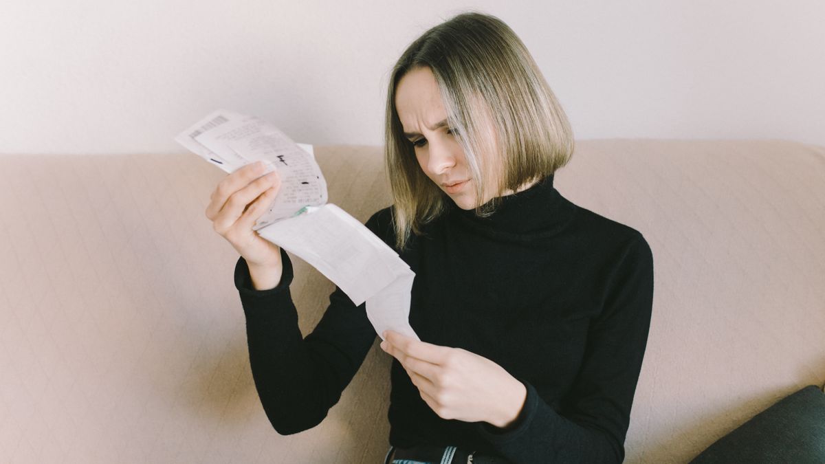person reviewing household budget documents