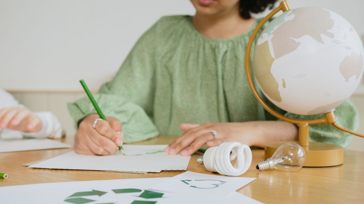 person studying weather map at desk