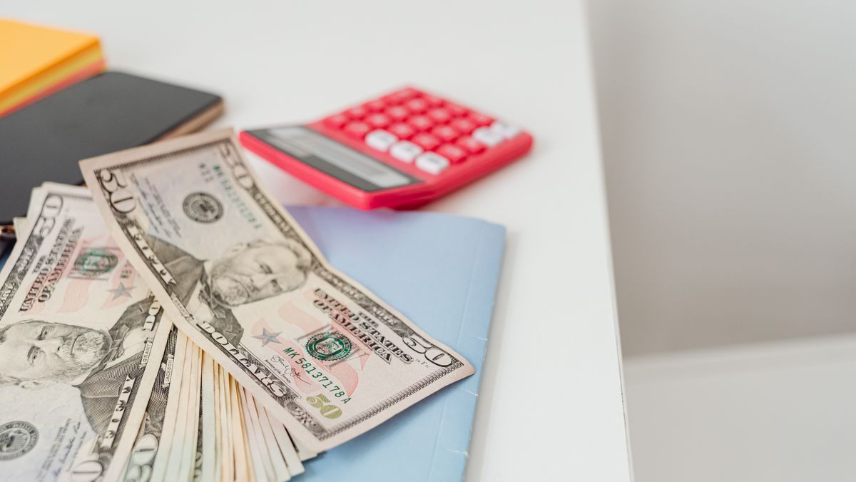 calculator with household budget notebook