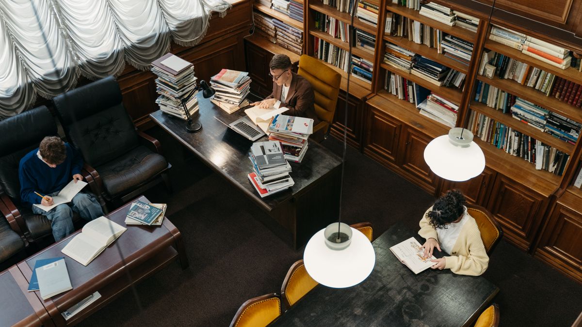 law textbooks stacked on study desk